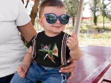 Camiseta bebé Link Wind Walker “Link Wind Walker y la Kame House” – Parodia de Zelda